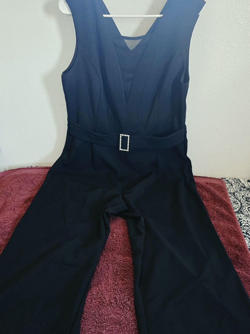 Sleek Black Sleeveless Jumpsuit with Rhinestone Buckle